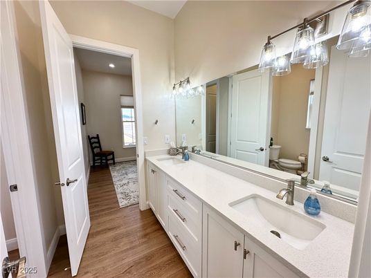 Bathroom, Dual Sink Vanities, Interior, Recessed Lighting, Wood Texture Flooring