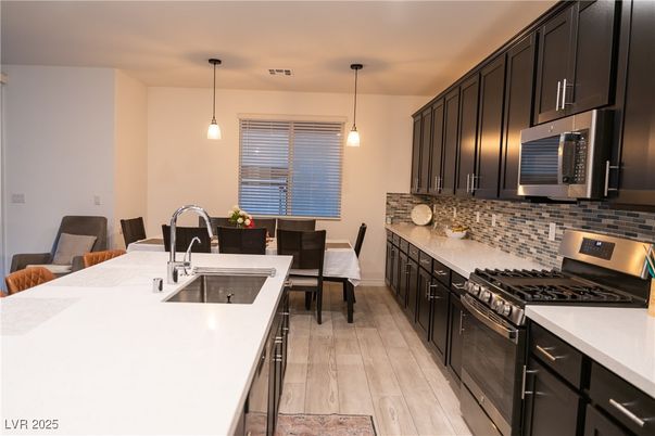 Dining room, Interior, Kitchen, Pendant Lights, Stainless Steel Appliances, Wood Texture Flooring