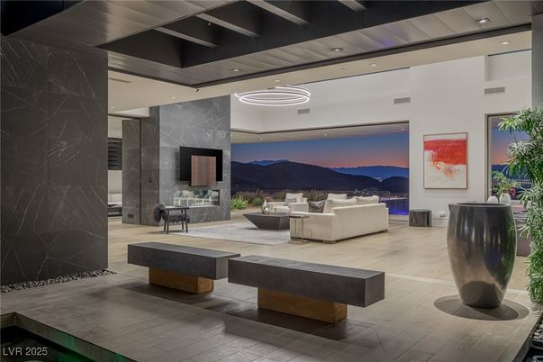 Fireplace, Interior, Living room, Marble Walls, Pendant Lights, Recessed Lighting, Wood Texture Flooring