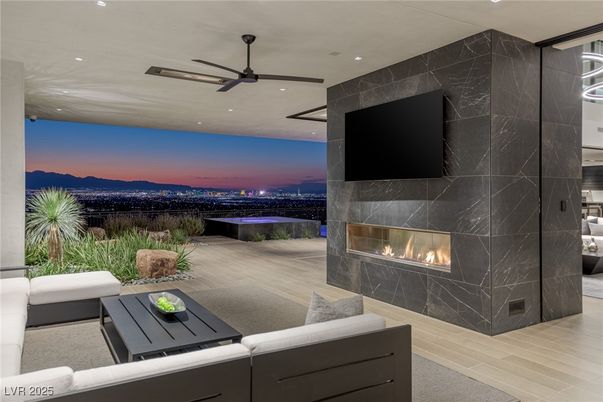 Fireplace, Interior, Living room, Marble Walls, Recessed Lighting, Wood Texture Flooring