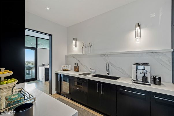 Interior, Kitchen, Marble Walls, Recessed Lighting, Stainless Steel Appliances, Wood Texture Flooring