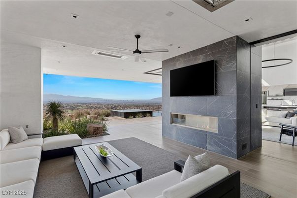 Fireplace, Interior, Living room, Marble Walls, Recessed Lighting, Water, Wood Texture Flooring