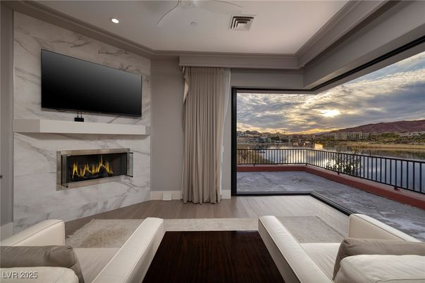 Fireplace, Interior, Living room, Recessed Lighting, Water, Wood Texture Flooring