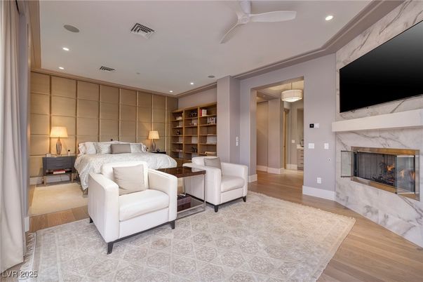 Bedroom, Fireplace, Interior, Recessed Lighting, Wood Texture Flooring