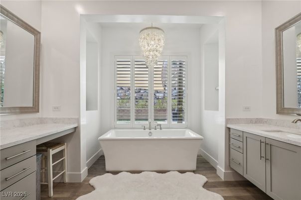 Bathroom, Chandelier, Dual Sink Vanities, Free Standing Baths, Interior, Wood Texture Flooring