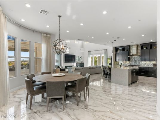 Chandelier, Dining room, Interior, Kitchen, Living room, Marble, Pendant Lights, Recessed Lighting, Stainless Steel Appliances