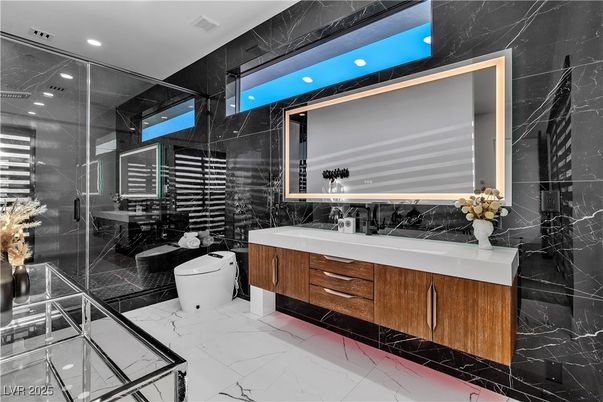 Bathroom, Dual Sink Vanities, Glass Shower, Interior, Marble, Marble Walls, Recessed Lighting