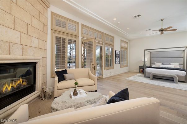 Bedroom, Fireplace, Interior, Living room, Recessed Lighting, Stone Walls, Wood Texture Flooring