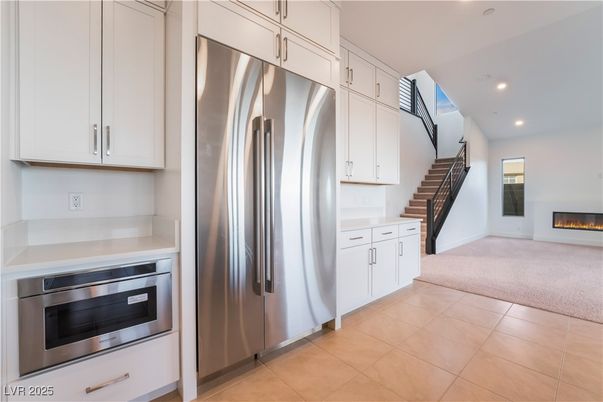 Fireplace, Interior, Kitchen, Recessed Lighting, Stainless Steel Appliances