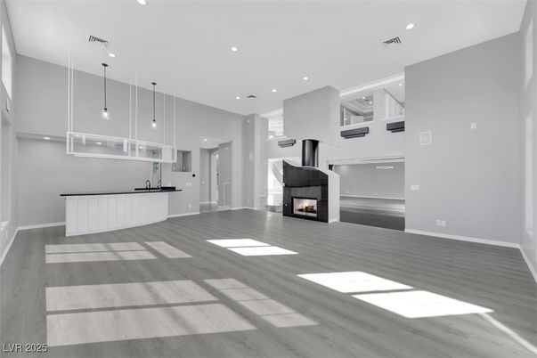 Empty room, Fireplace, Interior, Pendant Lights, Recessed Lighting, Wood Texture Flooring