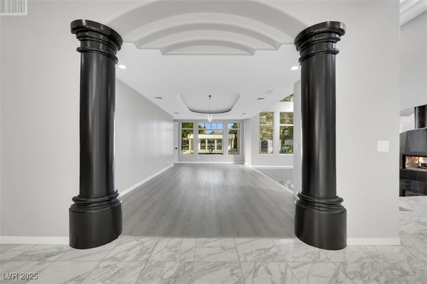 Fireplace, Interior, Marble, Pendant Lights, Recessed Lighting, Wood Texture Flooring