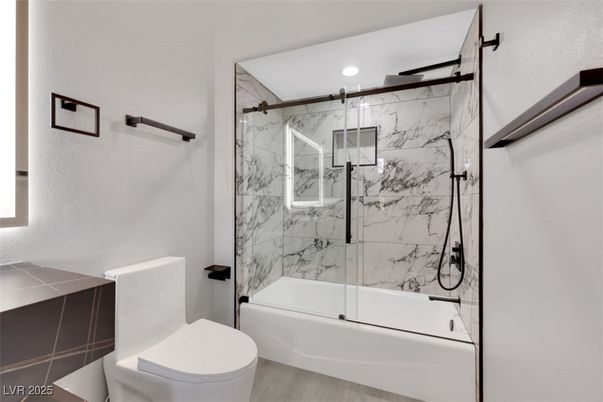 Bathroom, Glass Shower, Interior, Marble Walls, Recessed Lighting, Wood Texture Flooring