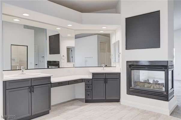Bathroom, Dual Sink Vanities, Fireplace, Interior, Recessed Lighting, Wood Texture Flooring