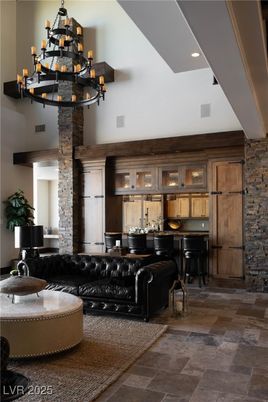 Chandelier, Interior, Living room, Piano, Recessed Lighting, Stone Walls