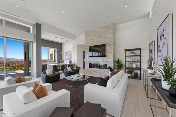 Fireplace, Interior, Living room, Marble Walls, Pendant Lights, Recessed Lighting, Wood Texture Flooring