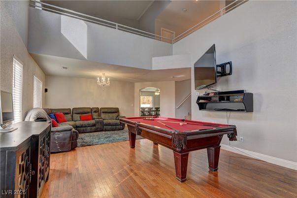Billiard Table, Chandelier, Game Room, Interior, Living room, Recessed Lighting, Wood Texture Flooring