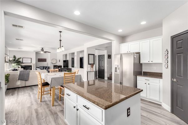 Dining room, Interior, Kitchen, Living room, Pendant Lights, Recessed Lighting, Stainless Steel Appliances, Wood Texture Flooring