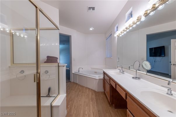 Bathroom, Dual Sink Vanities, Glass Shower, Interior, Recessed Lighting, Wood Texture Flooring