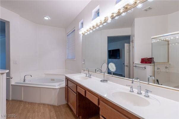 Bathroom, Dual Sink Vanities, Interior, Recessed Lighting, Wood Texture Flooring