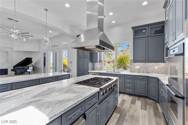 Interior, Kitchen, Pendant Lights, Piano, Recessed Lighting, Stainless Steel Appliances, Wood Texture Flooring