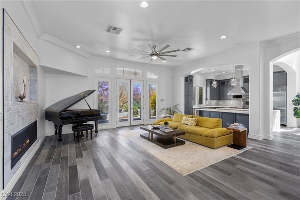 Fireplace, Interior, Living room, Pendant Lights, Piano, Recessed Lighting, Stone Walls, Wood Texture Flooring