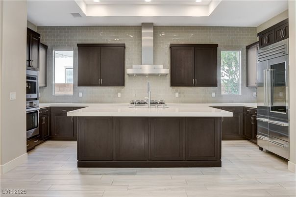 Interior, Kitchen, Recessed Lighting, Stainless Steel Appliances, Stone Walls, Wood Texture Flooring