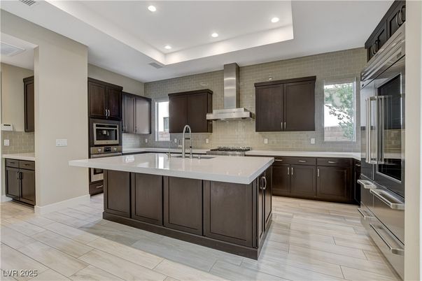 Interior, Kitchen, Recessed Lighting, Stainless Steel Appliances, Stone Walls, Wood Texture Flooring