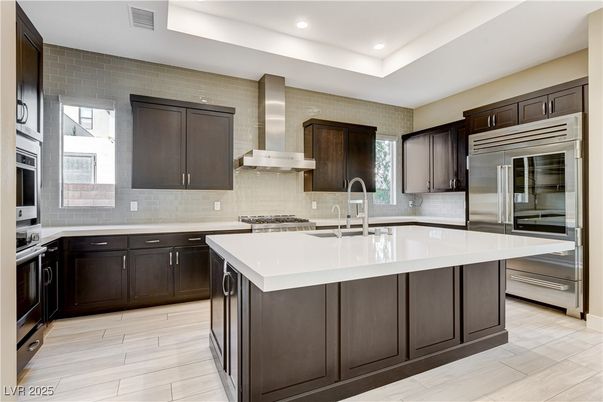 Interior, Kitchen, Recessed Lighting, Stainless Steel Appliances, Stone Walls, Wood Texture Flooring