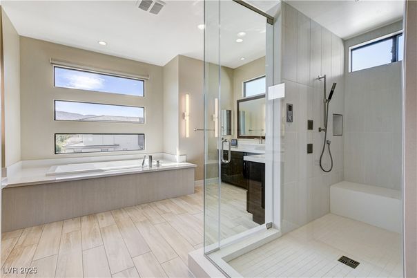 Bathroom, Dual Sink Vanities, Glass Shower, Interior, Recessed Lighting, Wood Texture Flooring