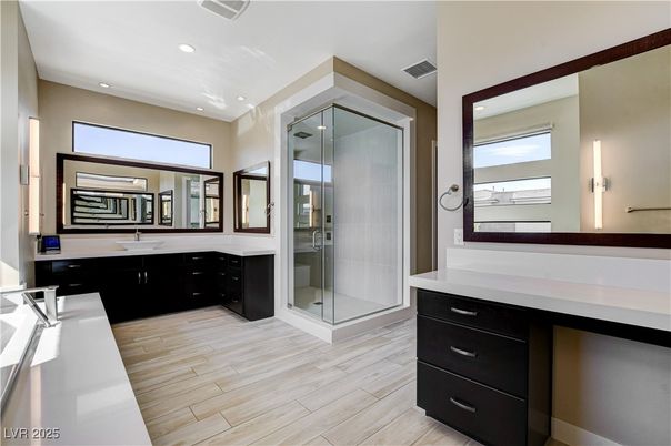 Bathroom, Dual Sink Vanities, Glass Shower, Interior, Recessed Lighting, Wood Texture Flooring