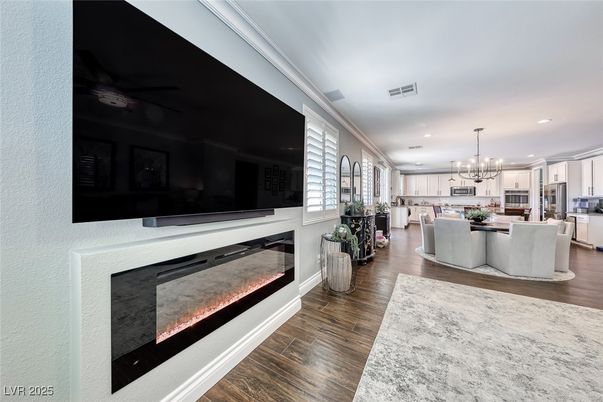 Dining room, Fireplace, Interior, Kitchen, Pendant Lights, Recessed Lighting, Wood Texture Flooring