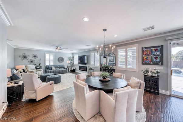 Chandelier, Dining room, Fireplace, Interior, Living room, Recessed Lighting, Wood Texture Flooring