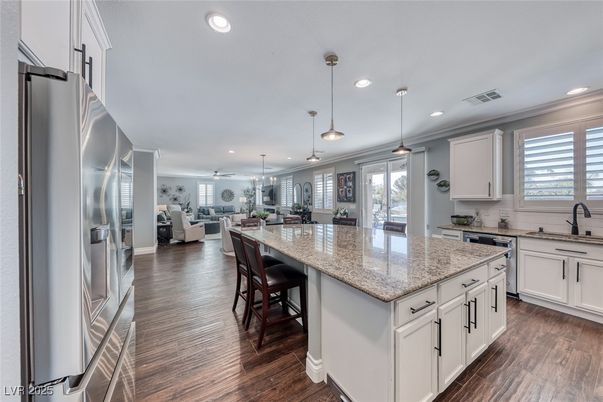 Dining room, Interior, Kitchen, Living room, Pendant Lights, Recessed Lighting, Stainless Steel Appliances, Wood Texture Flooring