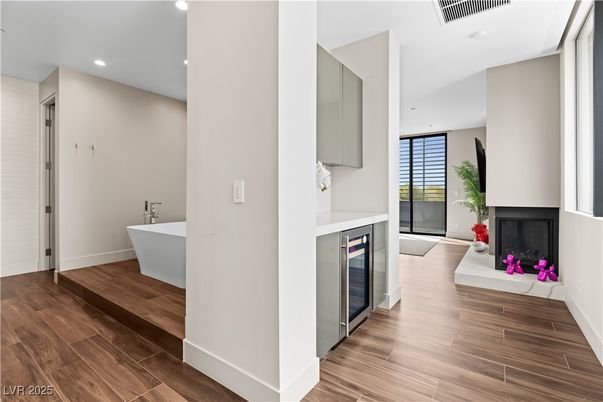 Bathroom, Fireplace, Free Standing Baths, Interior, Recessed Lighting, Wood Texture Flooring