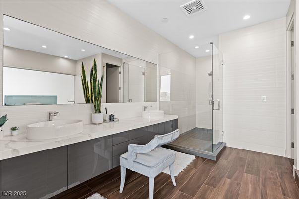 Bathroom, Dual Sink Vanities, Glass Shower, Interior, Recessed Lighting, Wood Texture Flooring