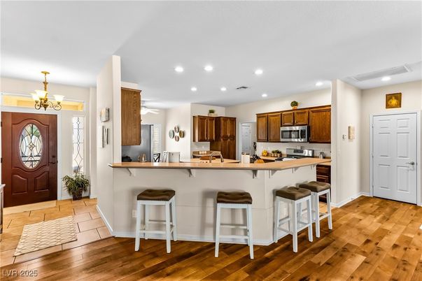 Chandelier, Interior, Kitchen, Recessed Lighting, Stainless Steel Appliances, Wood Texture Flooring