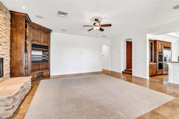 Empty room, Fireplace, Interior, Kitchen, Recessed Lighting, Stainless Steel Appliances