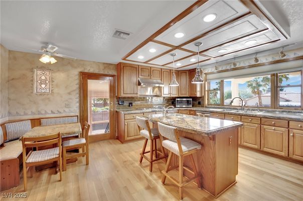 Dining room, Interior, Kitchen, Recessed Lighting, Stainless Steel Appliances, Wood Texture Flooring