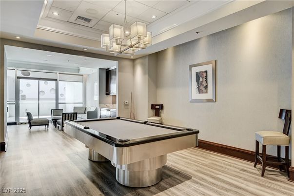 Billiard Table, Chandelier, Game Room, Interior, Pendant Lights, Recessed Lighting, Wood Texture Flooring