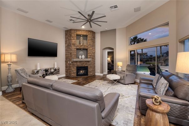 Fireplace, Interior, Living room, Recessed Lighting, Stone Walls, Wood Texture Flooring