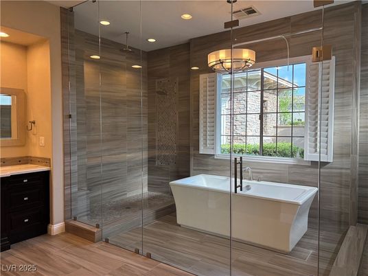 Bathroom, Free Standing Baths, Glass Shower, Interior, Pendant Lights, Recessed Lighting, Wood Texture Flooring