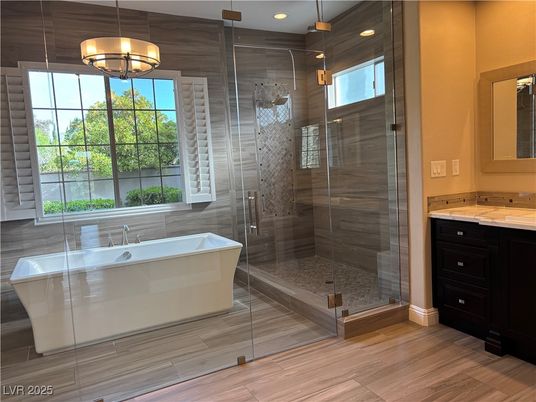 Bathroom, Free Standing Baths, Glass Shower, Interior, Pendant Lights, Recessed Lighting, Wood Texture Flooring