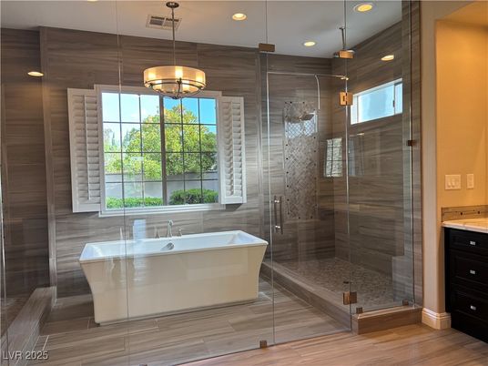 Bathroom, Free Standing Baths, Glass Shower, Interior, Pendant Lights, Recessed Lighting, Wood Texture Flooring