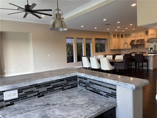 Dining room, Interior, Kitchen, Pendant Lights, Recessed Lighting, Stainless Steel Appliances, Wood Texture Flooring