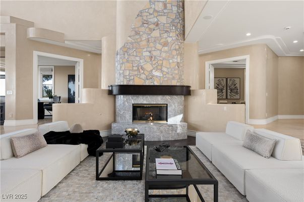 Fireplace, Interior, Living room, Recessed Lighting, Stone Walls, Wood Texture Flooring