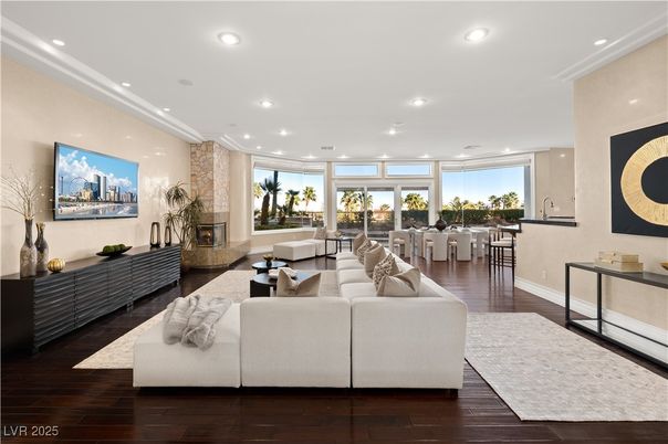 Dining room, Fireplace, Interior, Living room, Recessed Lighting, Stone Walls, Wood Texture Flooring