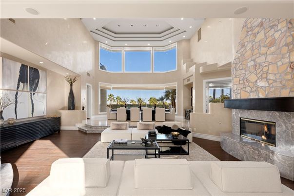 Fireplace, Interior, Living room, Recessed Lighting, Stone Walls, Wood Texture Flooring