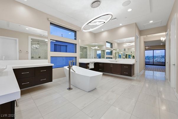 Bathroom, Dual Sink Vanities, Free Standing Baths, Interior, Pendant Lights, Recessed Lighting, Wood Texture Flooring