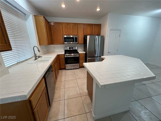 Interior, Kitchen, Recessed Lighting, Stainless Steel Appliances, Tile Countertops