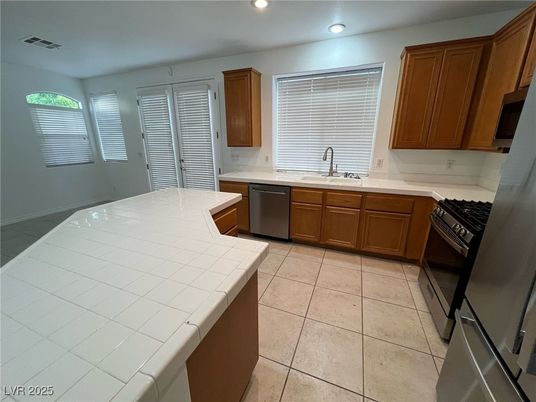 Interior, Kitchen, Recessed Lighting, Stainless Steel Appliances, Tile Countertops